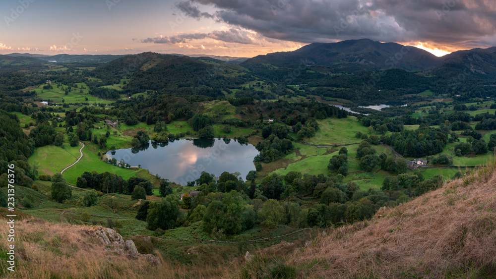 Loughrigg Tarn during Sunset, Lake District, UK Loughrigg Tarn during Sunset, Lake District, UK