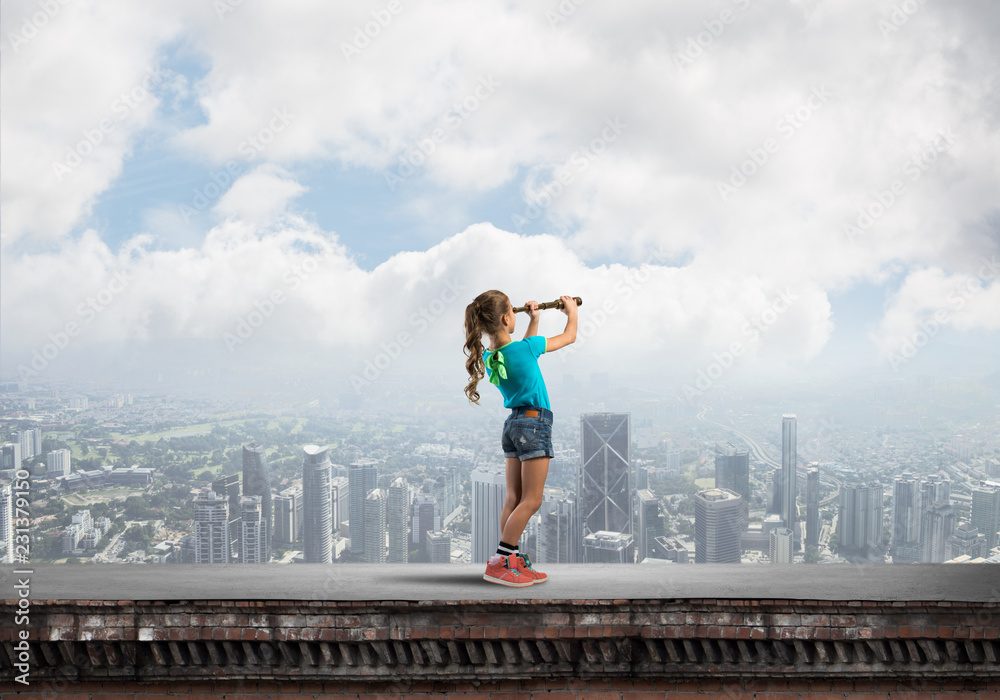Concept of careless happy childhood with girl exploring this world Concept of careless happy childhood with girl exploring this world