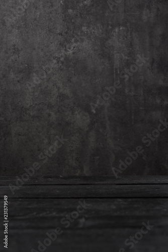 Wood texture and black concrete background. Wood and concrete for interior exterior decoration and industrial construction concept design. Natural wood and concrete texture. Selective focus.