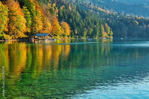 Fototapeta Naklejka Na Ścianę i Meble -  Beautiful blue mountain lake on a warm fall season day