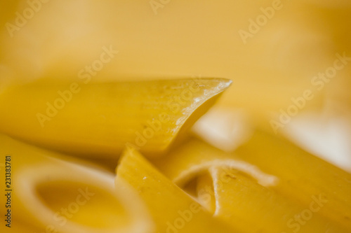 dry pasta  yellow pasta background