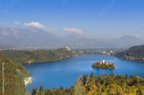 Autumn view on Bled Lake with Pilgrimage Church of the Assumption of Maria from the top © elvirkin