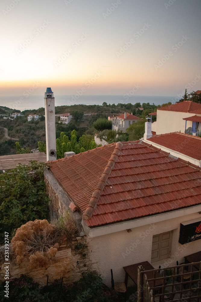 Typical Old Greek Houses and a View of a Small Greek Town of Chora in Greece in the Summer, Alonissos Island Part of the North Sporades, Region Thessali in the Aegean Sea
