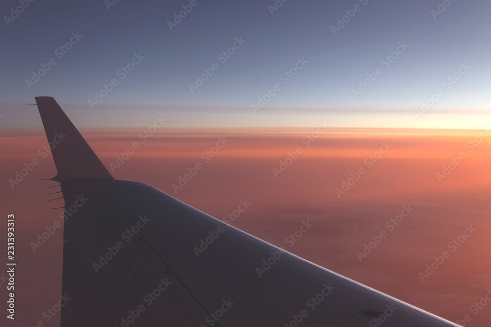 Beautiful sunset view from the plane window