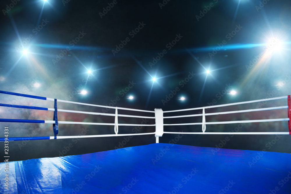 Empty boxing ring view on corner with white ropes Photos Adobe Stock