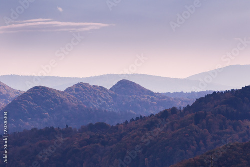 Mountain landscpae with peaks of the hills at dawn