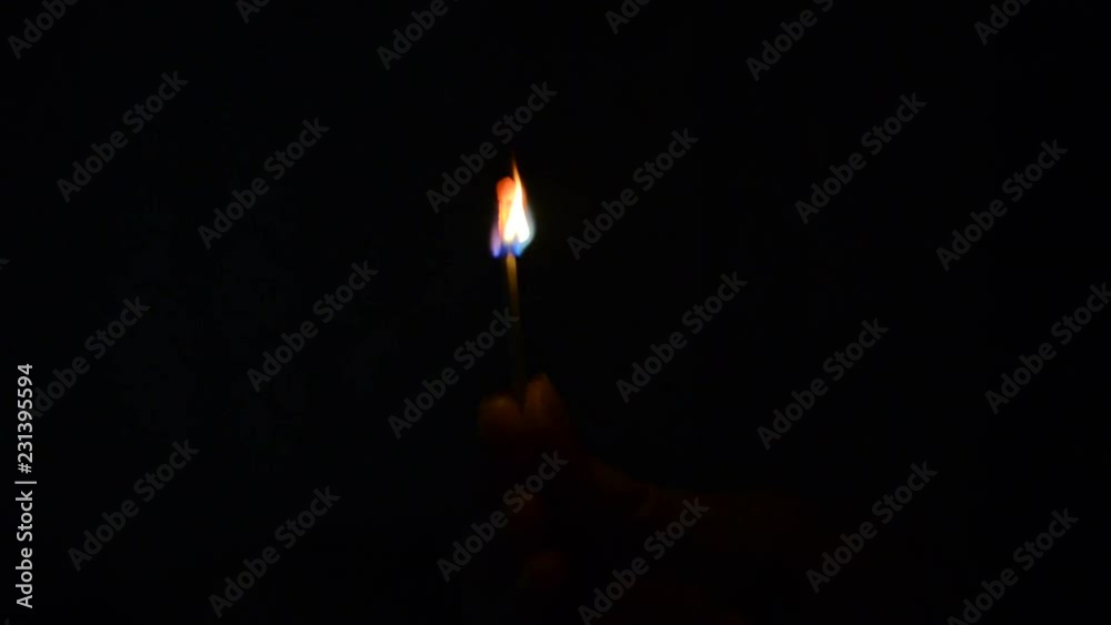 ignited and lit a match in the dark ignited and lit a match in the dark