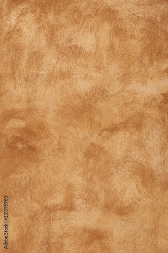 Grunge beige brown painted plaster wall background