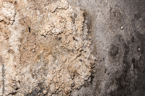 dark grunge texture of old cracked concrete wall, destroyed plaster layer of antique surface