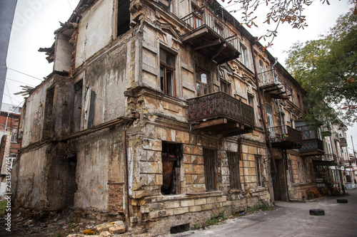Ruins of an old abandoned city. Ruined house in which poor people live. Odessa, the ruins of a historic residential building. The ruins of an old earthquake-hit house. Lost city.