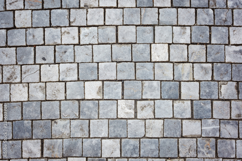 Background of sett. Cobblestone pavement. Texture. Background of sett. Cobblestone pavement. Texture.