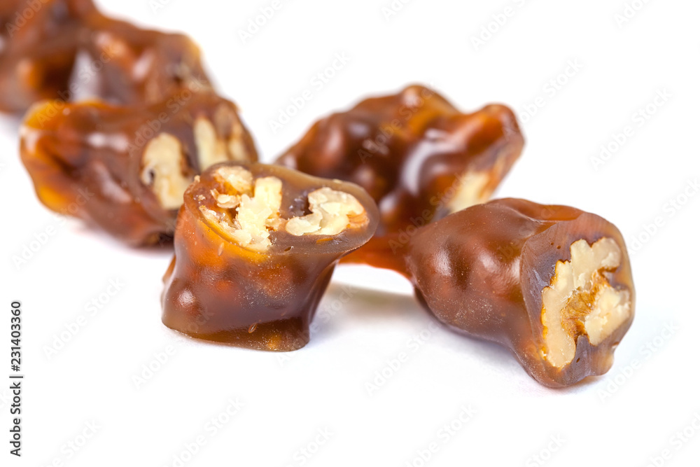 Tasty oriental sweets, churchkhela on  white background. Georgian national dessert