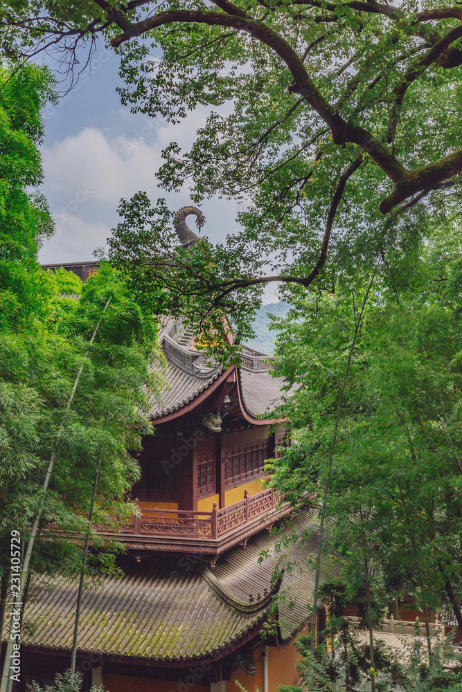 Traditional Chinese architecture among bamboos and trees, in Lingyin Temple, Hangzhou, China Traditional Chinese architecture among bamboos and trees, in Lingyin Temple, Hangzhou, China