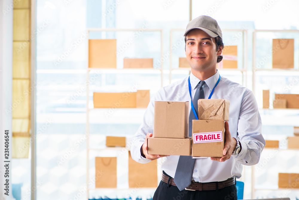Male employee working in box delivery relocation service Male employee working in box delivery relocation service