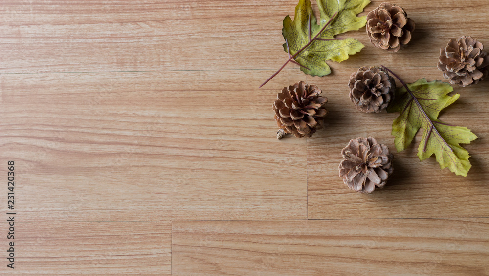 pine cones on wooden background pine cones on wooden background
