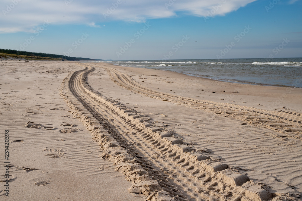 Autumn beach by the sea in central Europe. Baltic sea coast. Autumn beach by the sea in central Europe. Baltic sea coast.