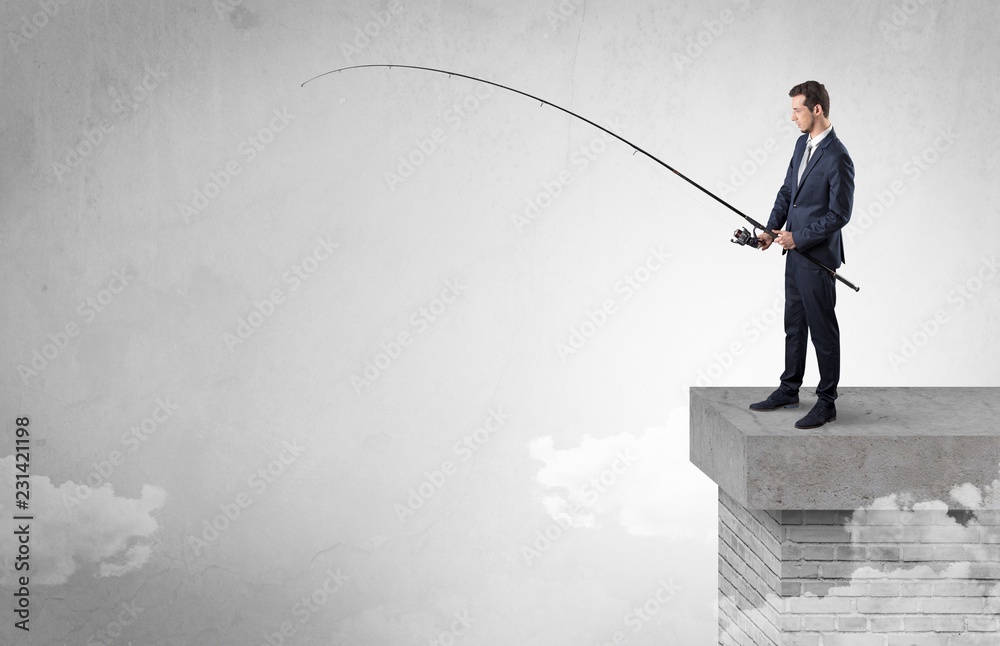 Businessman fishing nothing from the cloud with free copyspace Businessman fishing nothing from the cloud with free copyspace
