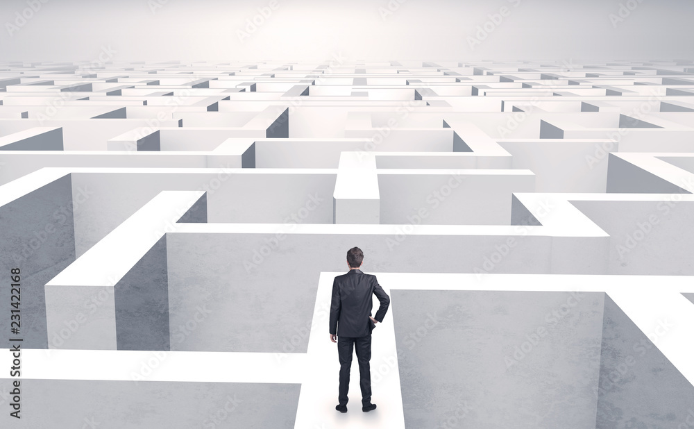 Small businessman in a middle of a huge maze
Small businessman in a middle of a huge maze