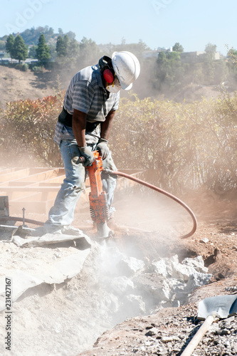 man working with a jackhammer