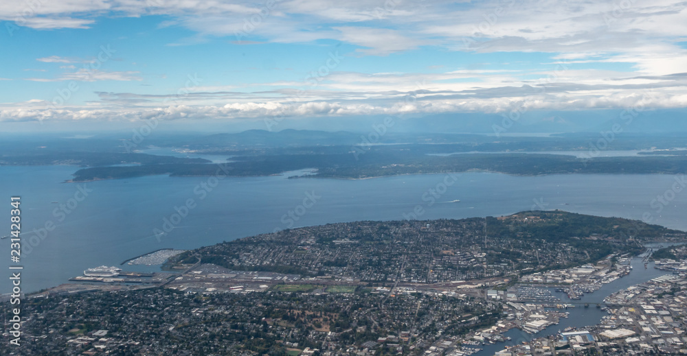 Aerial View of the Seattle Bay from Airplane With Cloudy Day
