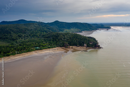 Aerial drone view of the rainforest, mangroves and beaches of the Bako area of Malaysia's Sarawak state in Borneo