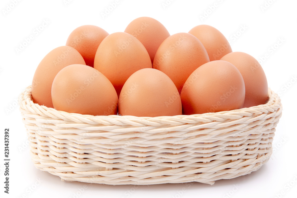 Brown Eggs in basket Isolated at White Background Brown Eggs in basket Isolated at White Background
