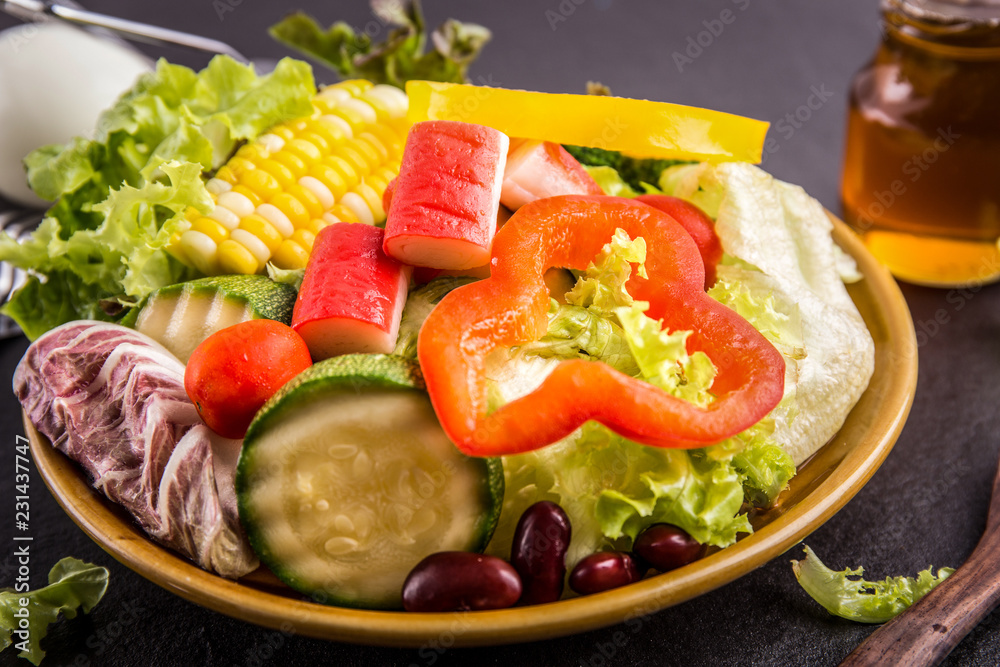 close up,.Salad healthy food on black stone background. .Weight loss. close up,.Salad healthy food on black stone background. .Weight loss.