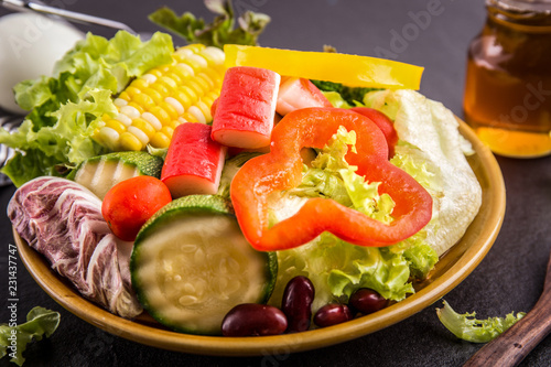 close up,.Salad healthy food on black stone background. .Weight loss.