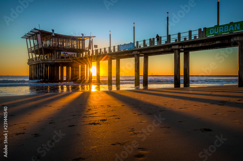 Moyo pier at sunrise photo