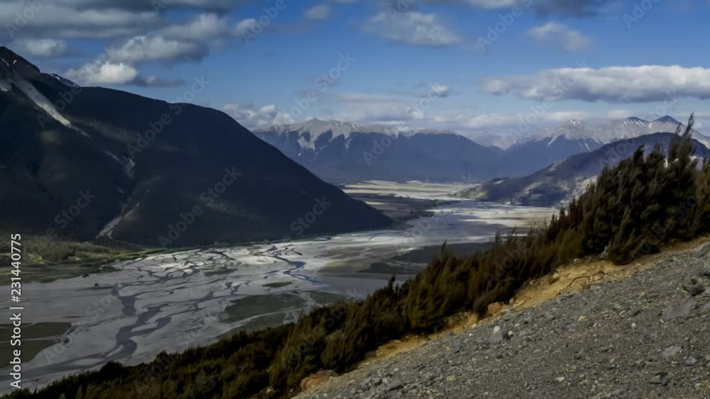 Timelapse video of beautiful glacial valley in Arthurs Pass National Park in New Zealand on sunny summer day. Timelapse video of beautiful glacial valley in Arthurs Pass National Park in New Zealand on sunny summer day.