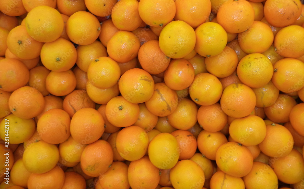 a bunch of fresh ripe tangerines