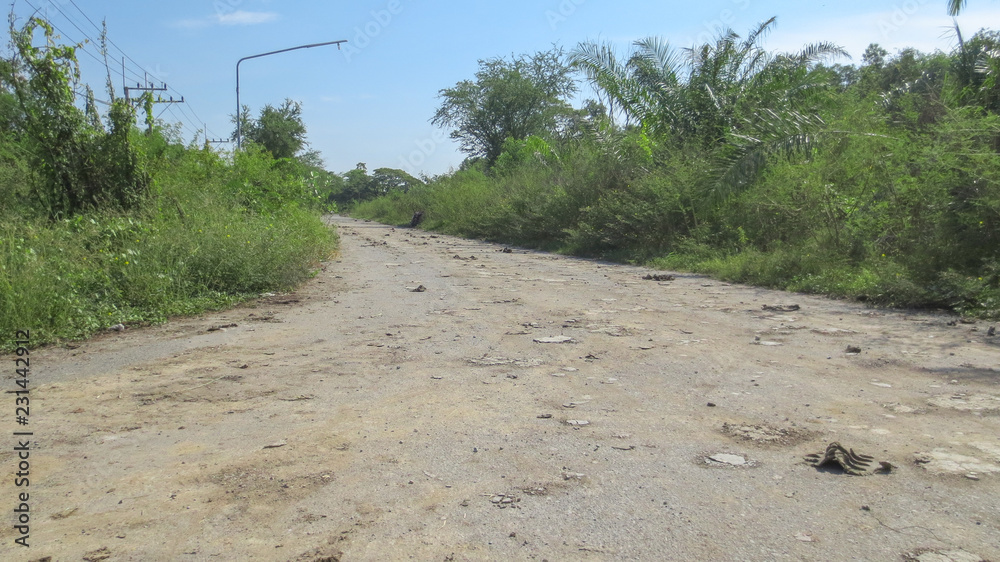 pile of dirt on dirty concrete road at thailand pile of dirt on dirty concrete road at thailand