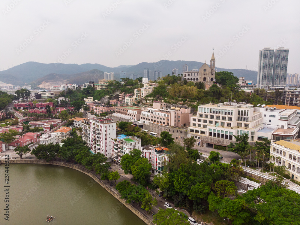 Macau cityscape with Penha hill and church Macau cityscape with Penha hill and church