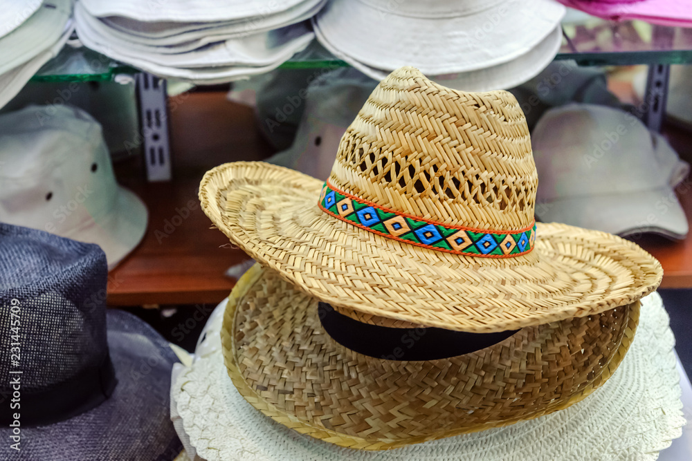 Men's straw hat in retro vintage style on sale in the market