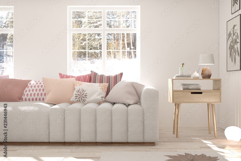 Obraz premium White room with sofa and winter landscape in window. Scandinavian interior design. 3D illustration