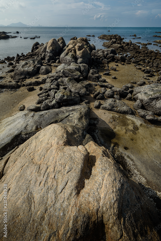 The rock on the beach with daylight The rock on the beach with daylight