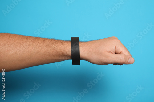 Identification concert black bracelet template, hand hospital security wristband mockup.