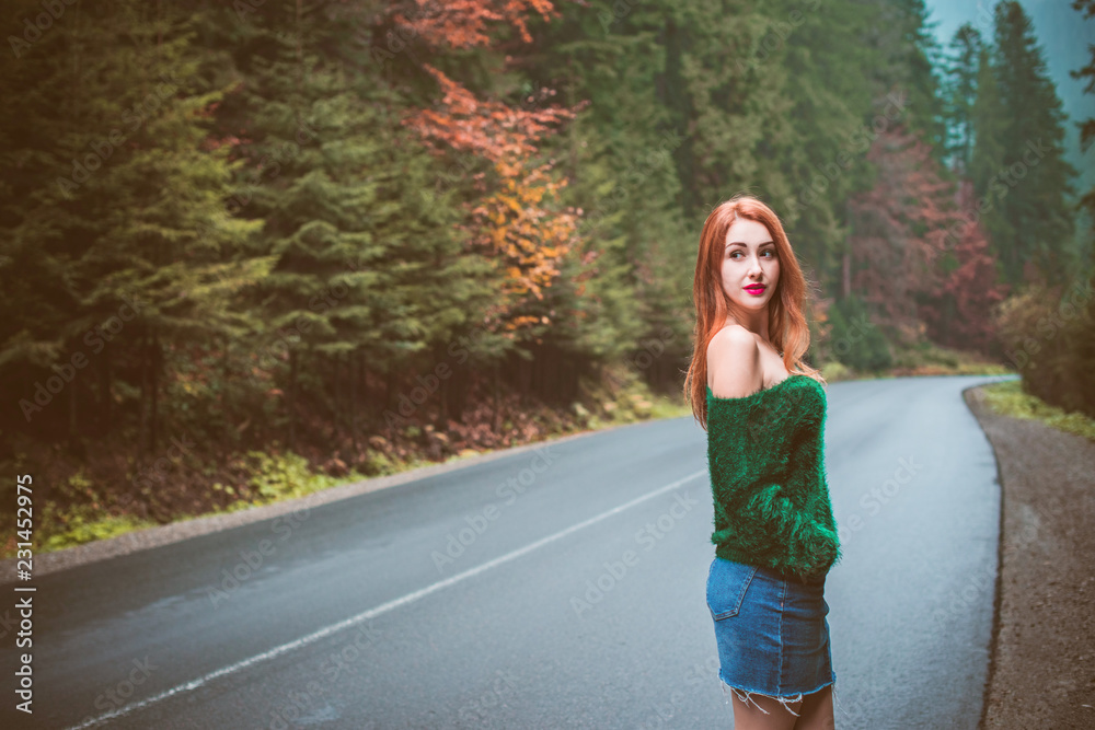 Pretty woman on a road. Travel concept, adventure and trip time Pretty woman on a road. Travel concept, adventure and trip time