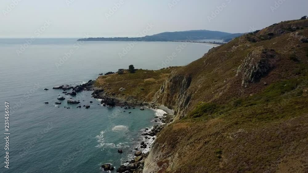 Parts of the steep, jagged coastline jut out into the sea, Marin Headlands