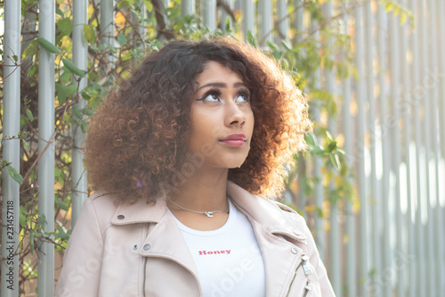 Portrait of young girl outdoors photo