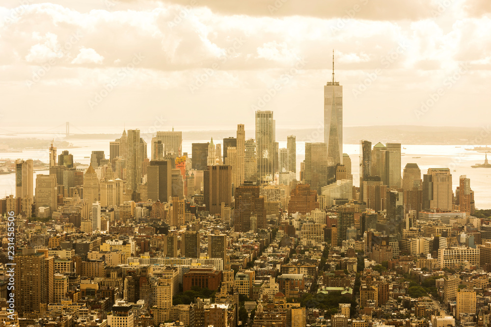 MANHATTAN, NEW YORK CITY. Manhattan skyline and skyscrapers aerial sunset view. New York City, USA..