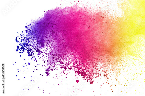 Freeze motion of colored powder explosions isolated on white background.