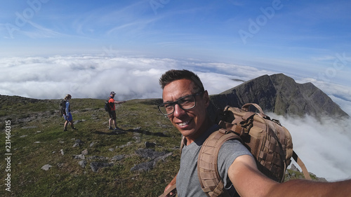 The man on the top of Carrauntoohil makes a selfie