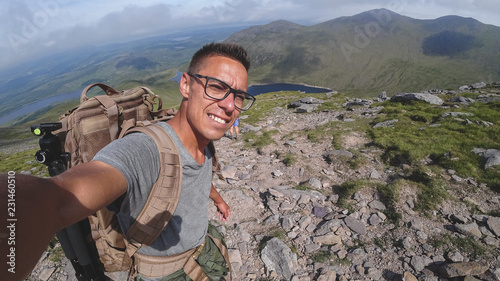 The man on the top of Carrauntoohil makes a selfie