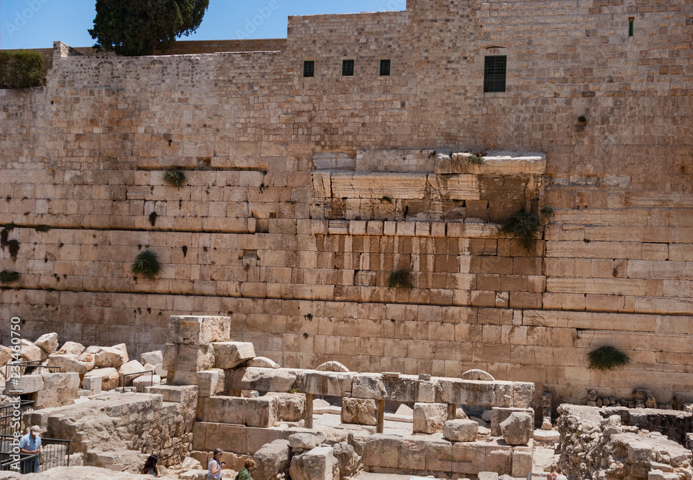 remnants of robinson's arch on the western wall above the herodian street  below the temple mount in Jerusalem