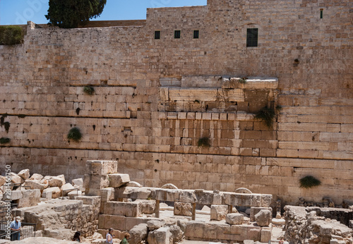 remnants of robinson's arch on the western wall above the herodian street  below the temple mount in Jerusalem photo