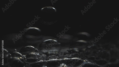 Wallpaper Mural Beautiful colored bubbles in a liquid on a black background. Close-up. Slow motion. Torontodigital.ca