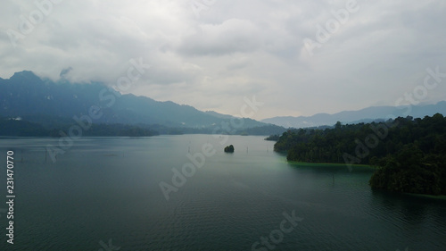 Aerial Khao Sok National Park with jungle and Clouds