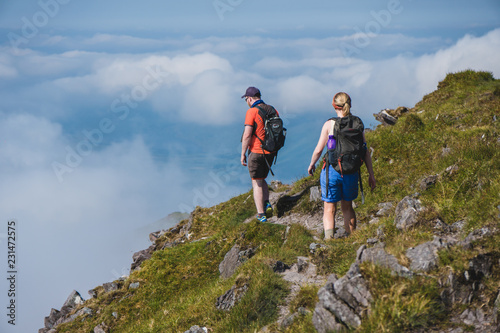 Man and woman on the trail to mount Carrauntoohil
