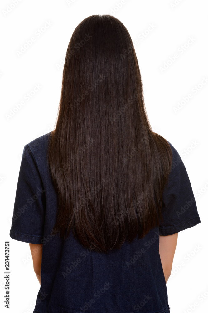 Naklejka premium Back view of young Asian teenage girl 